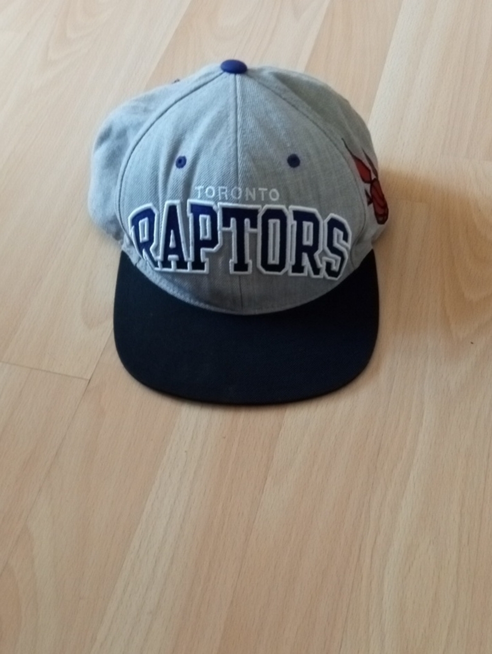 Mitchell & Ness Grey and Black Toronto Raptors Snapback with Navy Accents